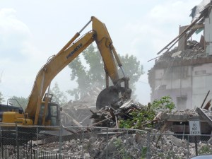 Tearing down the Plunkett School to make way for doughnuts. Photo, the author